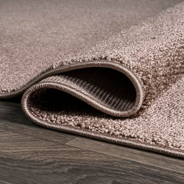 Haze Solid Low-Pile Area Rug Brown